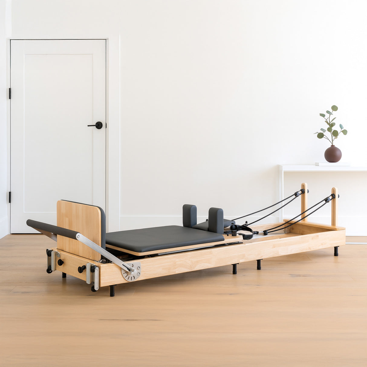 Pilates Reformer i naturfärgad ek