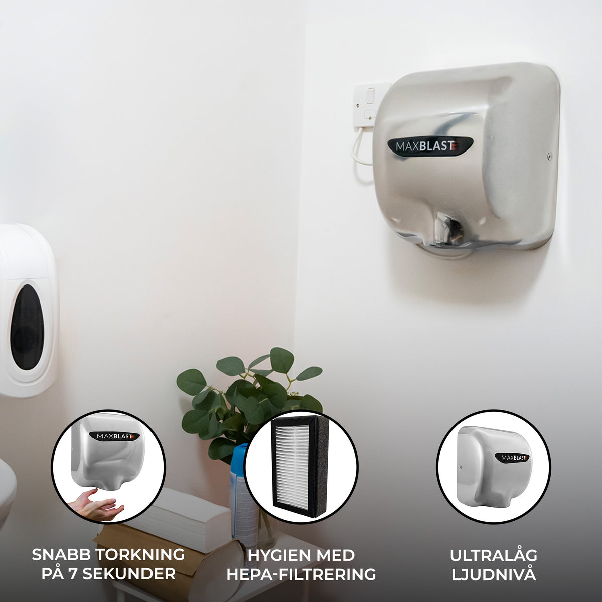 Snygg och modern handtorkare i silver, monterad på väggen, med HEPA-filter och ultralåg ljudnivå för hygienisk användning