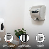 Snygg och modern handtorkare i silver, monterad på väggen, med HEPA-filter och ultralåg ljudnivå för hygienisk användning