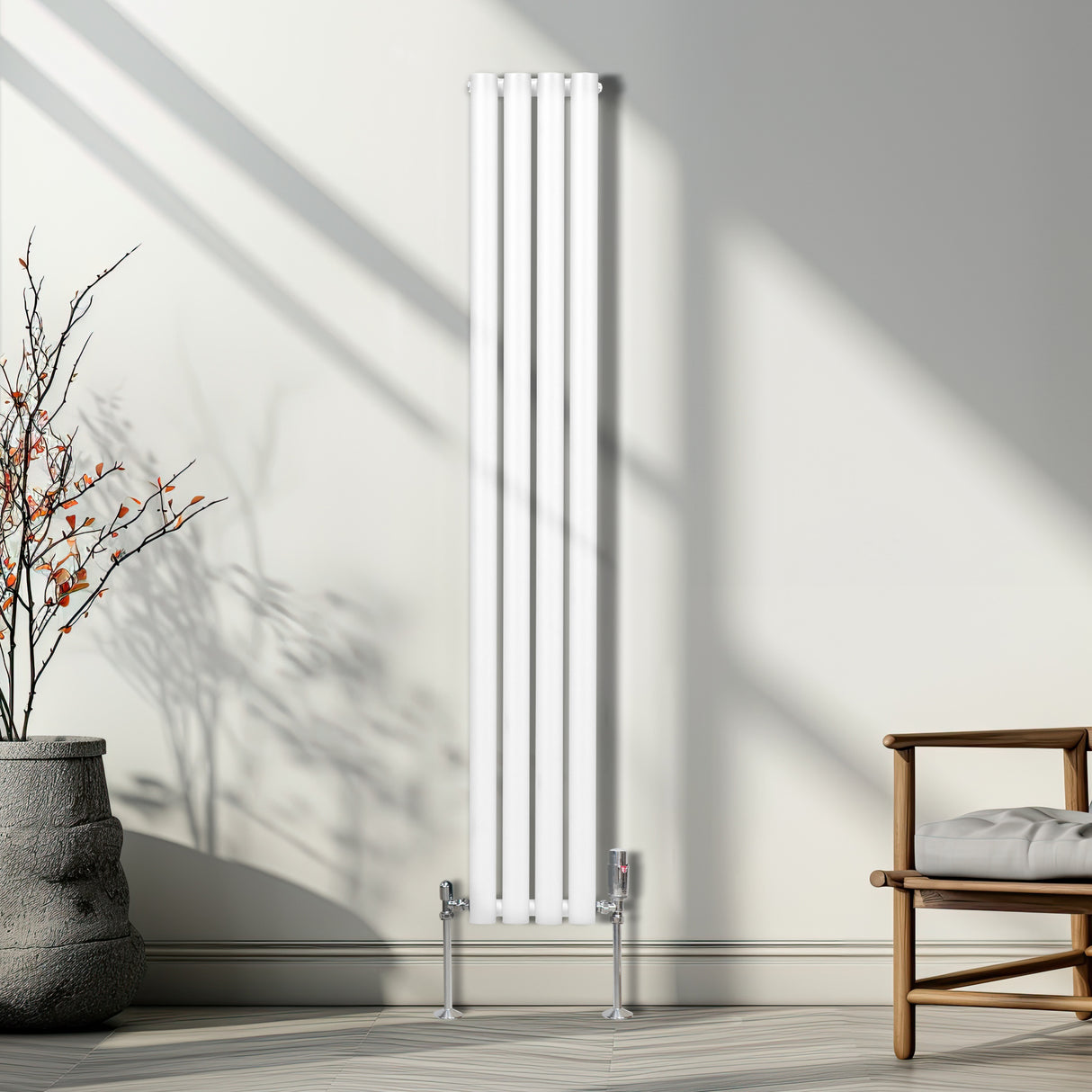 Förkromade termostatventiler i modern design, glänsande yta, placerade vid en stilren vit radiator i ett ljust rum