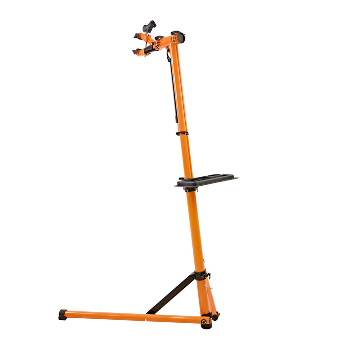Cykelställ i orange metall med justerbar höjd, två hållare för cykelram och en plattform för verktyg, stabil konstruktion