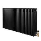 Svart traditionell 4-kolonnsradiator i metall, 600 x 1190 mm, med synliga ventiler och en slät, glänsande yta