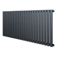 Oval enkelpelarradiator i antracitgrå med släta, cylindriska rör och modern design, perfekt för effektiv uppvärmning